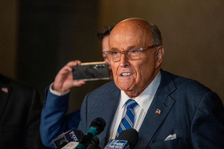 Trump pardons Giuliani, others accused of trying to overturn 2020 defeat