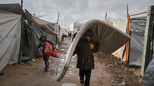 First strong winter rains soak Gaza’s makeshift shelters