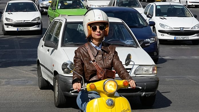 More women ride motorbikes in Tehran, testing Iran’s legal limits