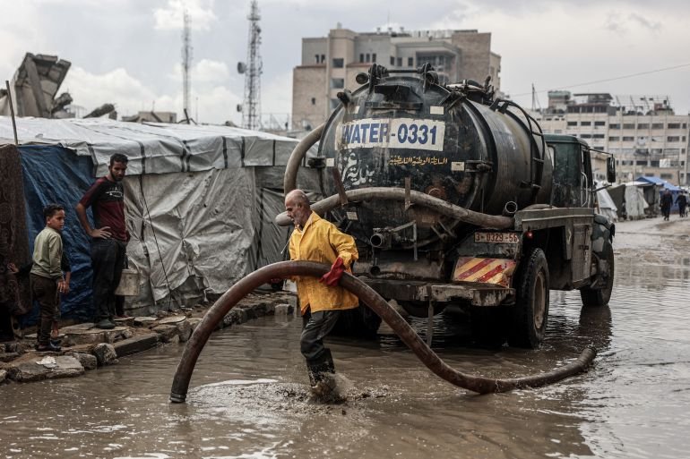 Displaced Palestinian families suffer as heavy rains flood Gaza tent camps