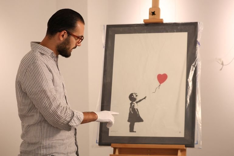 Man jailed for ‘smash and grab’ theft of Banksy’s Girl with Balloon print