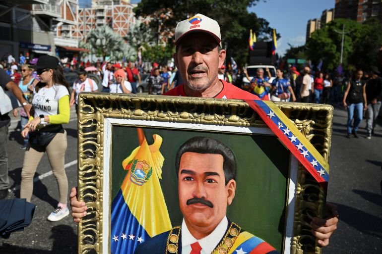 Thousands march in Venezuela to demand US frees President Maduro, wife