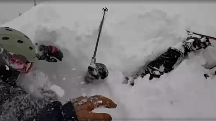 Dramatic rescue: Skier pulled alive from deep snow in California