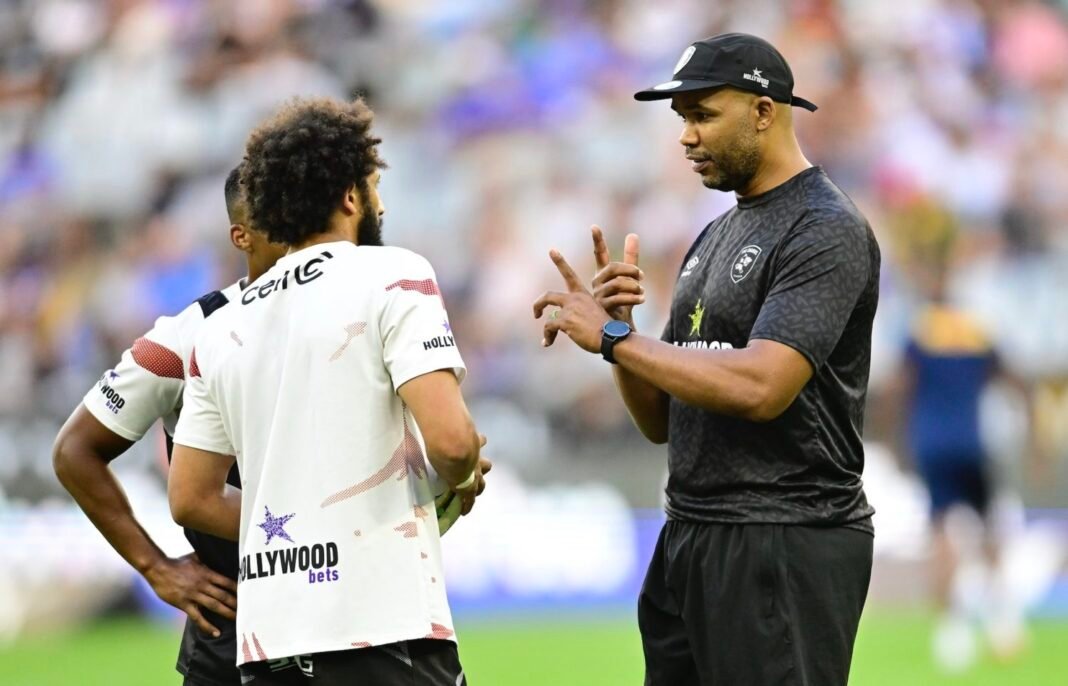 Sharks make coach call