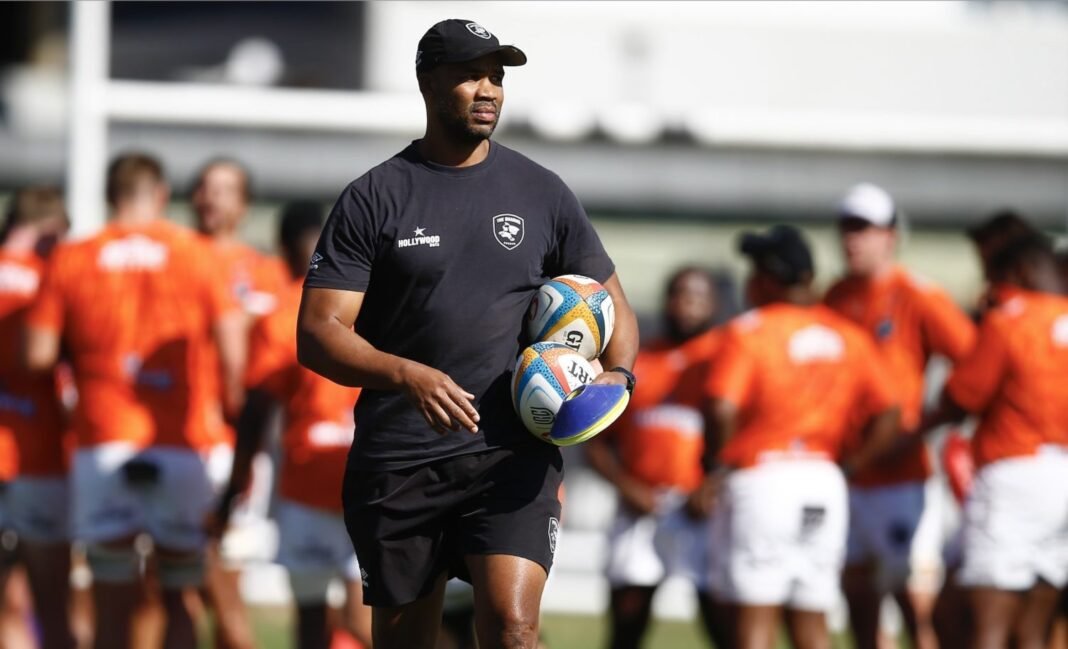 Sharks land attack coach