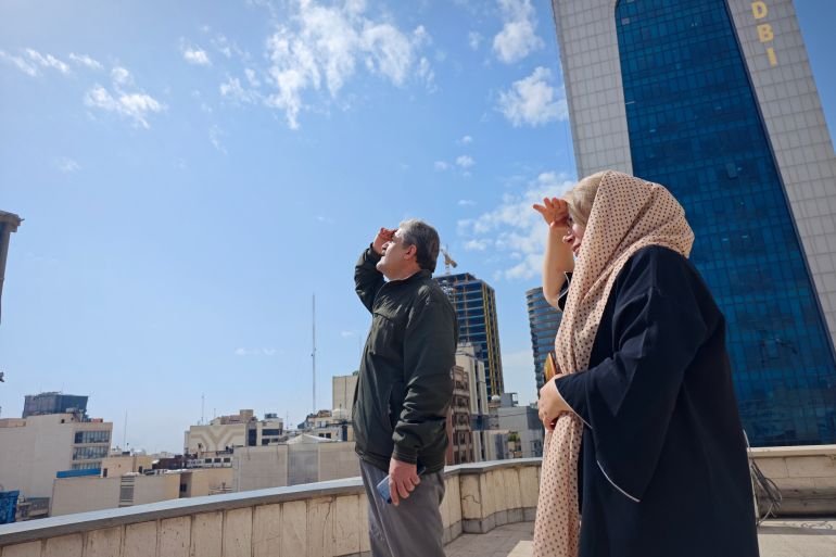 Iran, US, Israel officials give civilians clashing directives as bombs drop