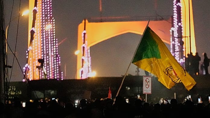 Iraqi police fire tear gas at pro-Iran protest near US embassy in Baghdad