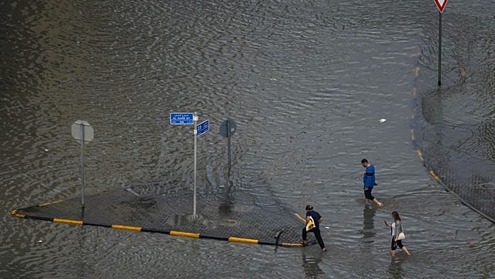 Flooded streets in Sharjah after heavy rain hits the United Arab Emirates