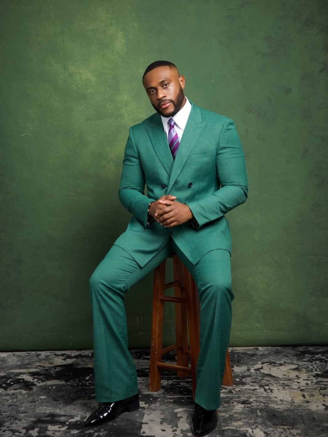 Kola Omotosho’s Teal Suit at Omotola Ekeinde’s Premiere Deserves Its Own Red Carpet