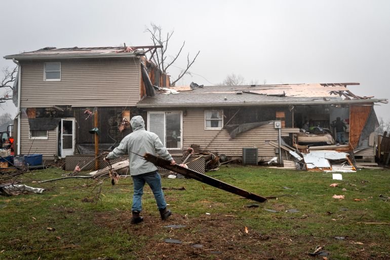 Two killed as tornadoes sweep across US Midwest in latest extreme weather