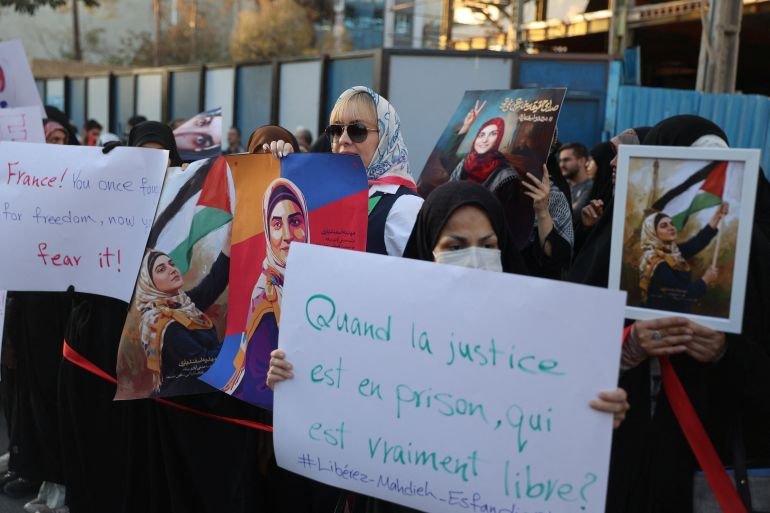 Iran citizen held in France over pro-Palestine comments returns home