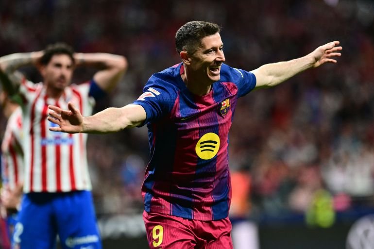 Lewandowski claims late La Liga win for Barcelona at Atletico