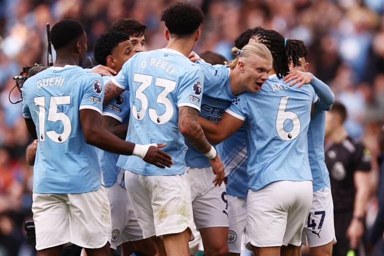 Man City beat Arsenal 2-1, cut Premier League race to three points