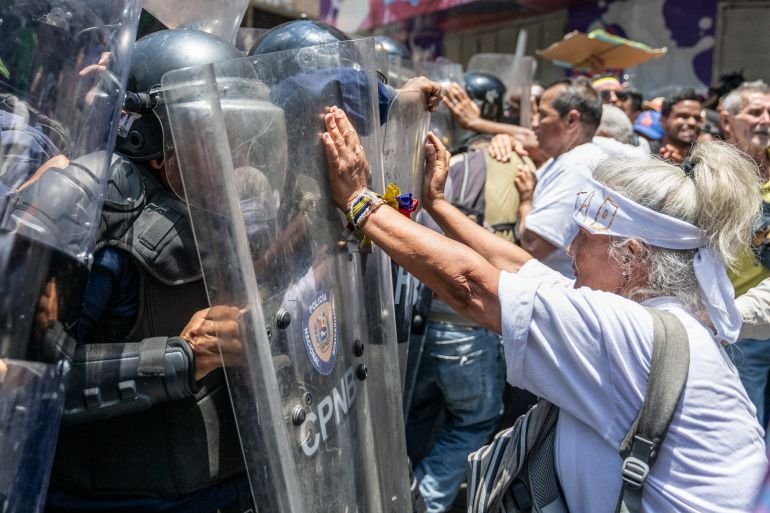 Police in Venezuela block protesters calling for higher wages, pensions