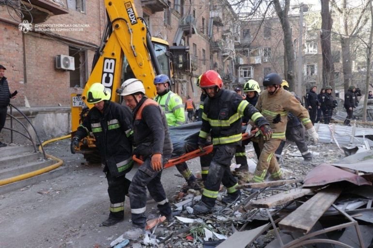 Russian attacks on Ukraine kill at least five, damage ship in port