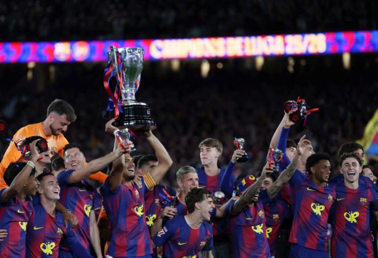 Barcelona fans celebrate winning La Liga title in El Clasico