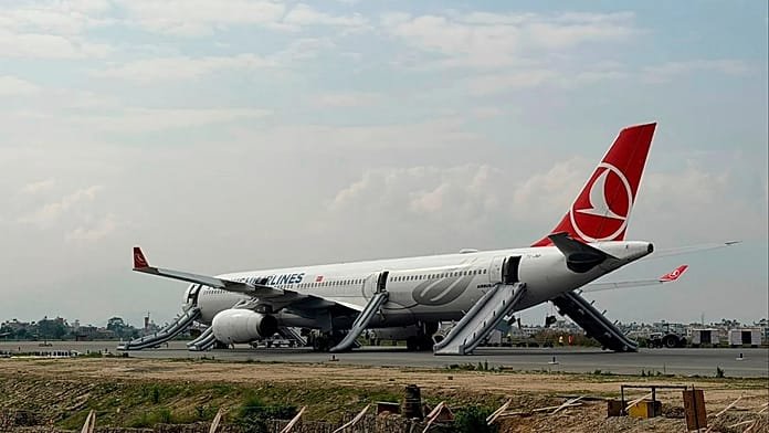 Turkish Airlines plane evacuated after landing gear fire in Nepal, officials say