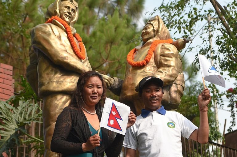 Two Nepali Sherpa climbers break own records on Mount Everest