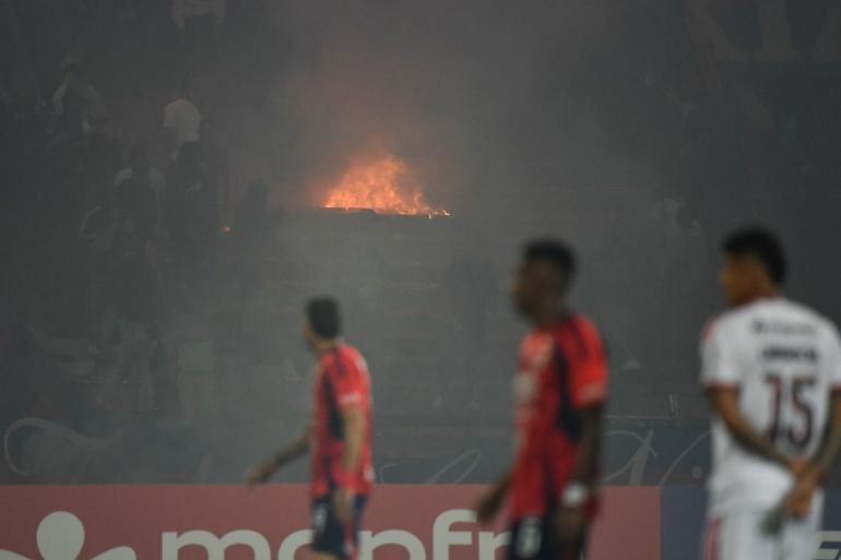 Holders Flamengo see Copa Libertadores match abandoned amid crowd trouble
