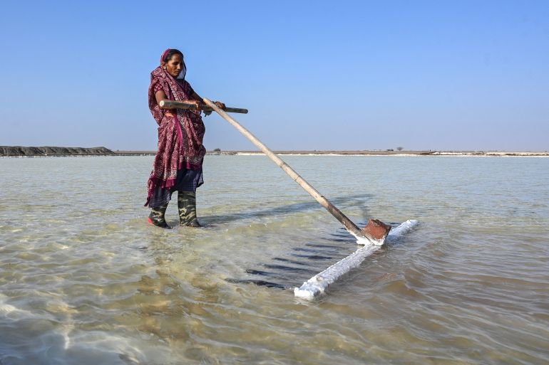 India’s salt workers brave brutal heat on Gujarat’s desert plains