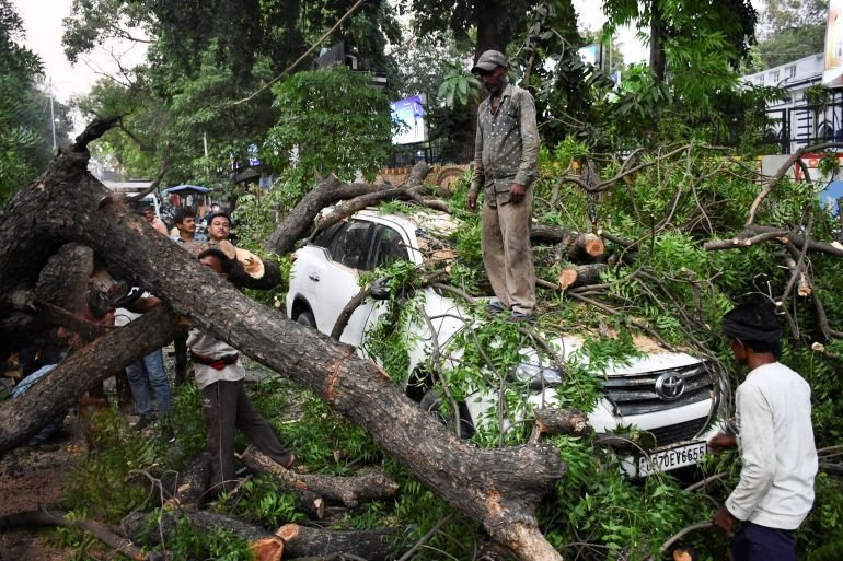 Duststorms and lightning kill at least 96 people in northern India